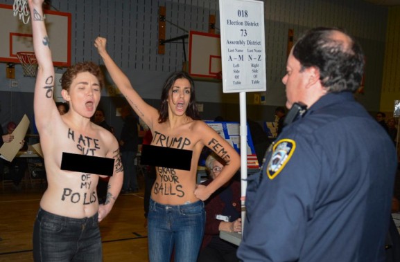 Two Unclad Ladies Protesting Against Donald Trump's Victory Arrested By Police  4461221_a_jpeg14a53cac5a312f3d1ad4980fec051d42