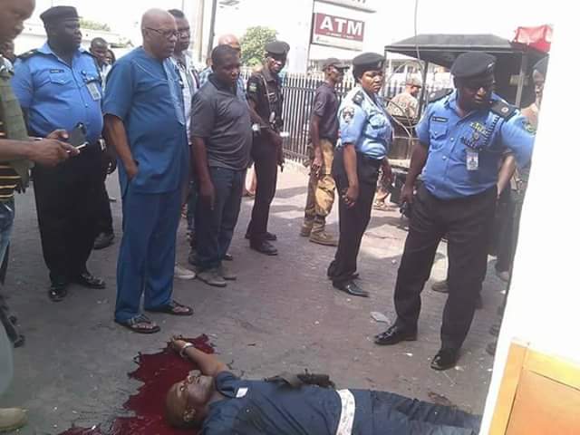 Armed Robber Shot Dead At Zenith Bank, Owerri By Police (Graphic Photos) 4905170_fbimg1487782180502_jpeg091308395a640cb6e439f83797f0abf2