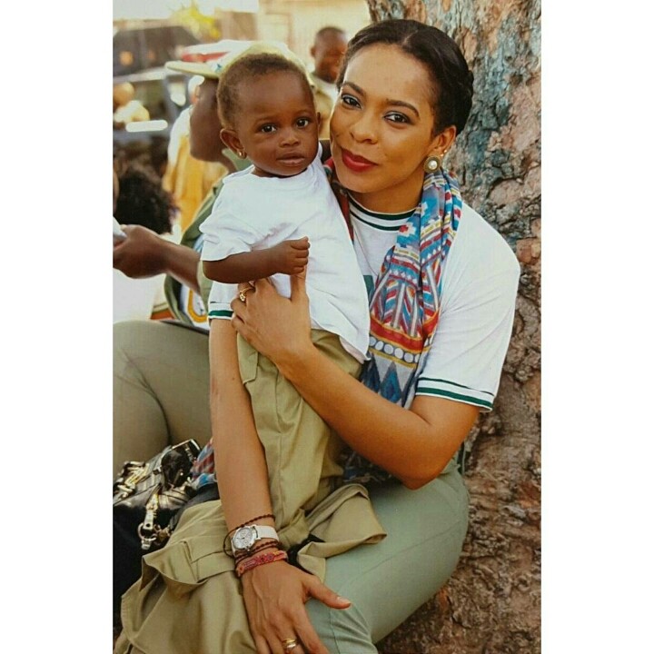 Image result for #BBNaija: Awww! Checkout This Adorable Photo Of TBoss Cradling A Baby During Her Service Year