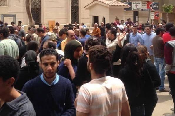 Egypt Palm Sunday Service Bombing: Blast Kills 21, Injures Dozen 5129246_an119418733relativesandon_jpegba667eeaa0966b6172559c513b99d2f2