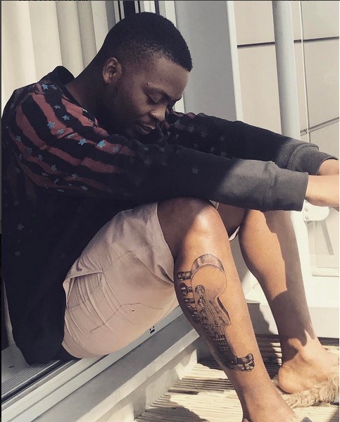 Image result for olamide tattoo