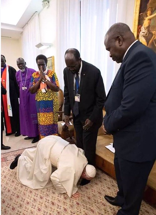 Pope Francis Kisses The Feet Of South Sudan President Salva Kiir Photo
