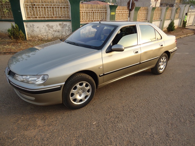 **SuspendedPeugeot 406 + solid A/C  Abuja...Can travel to any part