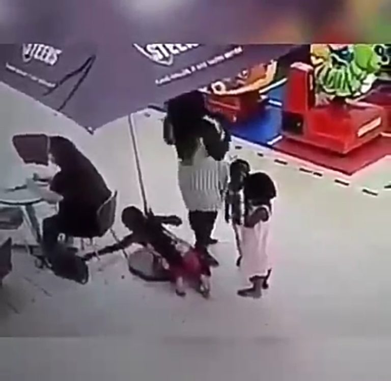 Little Girl Caught On Camera Stealing A Ladys Bag While