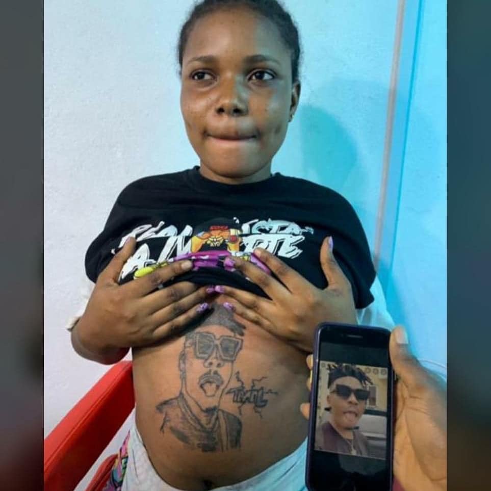 A Die-hard Lady Fan Tattoos Her Favorite Artiste, Mayokun, On Her Stomach -  Celebrities - Nigeria