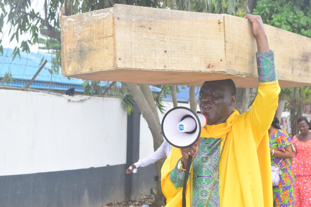 Jehovah Sharp Sharp Carries Coffin To Protest Against Buhari (Photo)