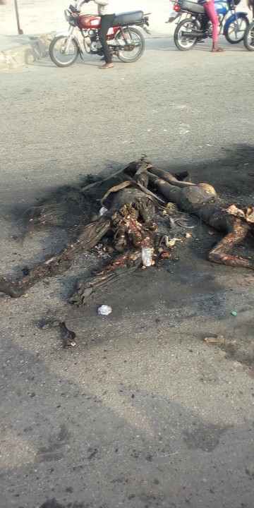 Two robbers, burnt to death at the Coker Express in Lagos