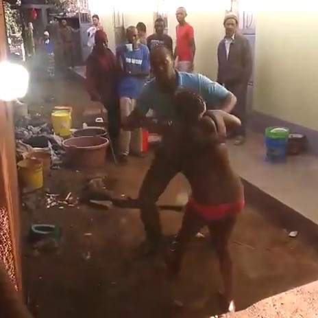 Husband Beats His Wife Almost To Death For Cheating As Peope Watch (pics) -...