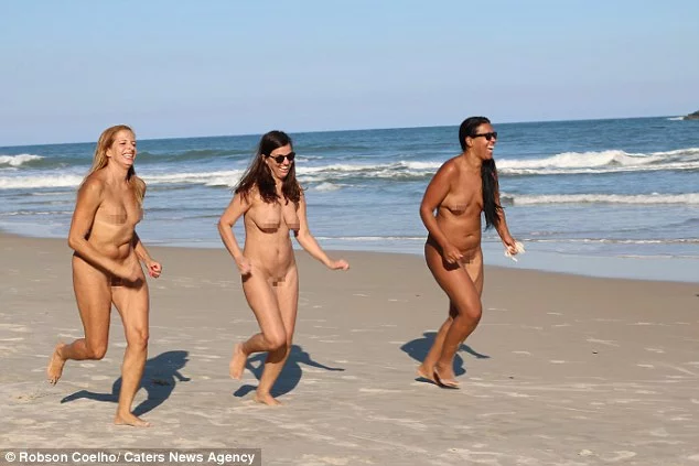 On a stunning beach in Rio de Janeiro a group of brave souls have stripped ...