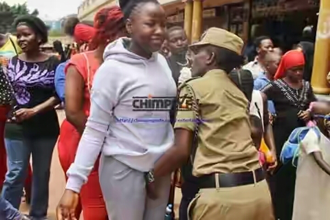 PHOTOS: Ugandan Police Search Women To Their Pants Before 