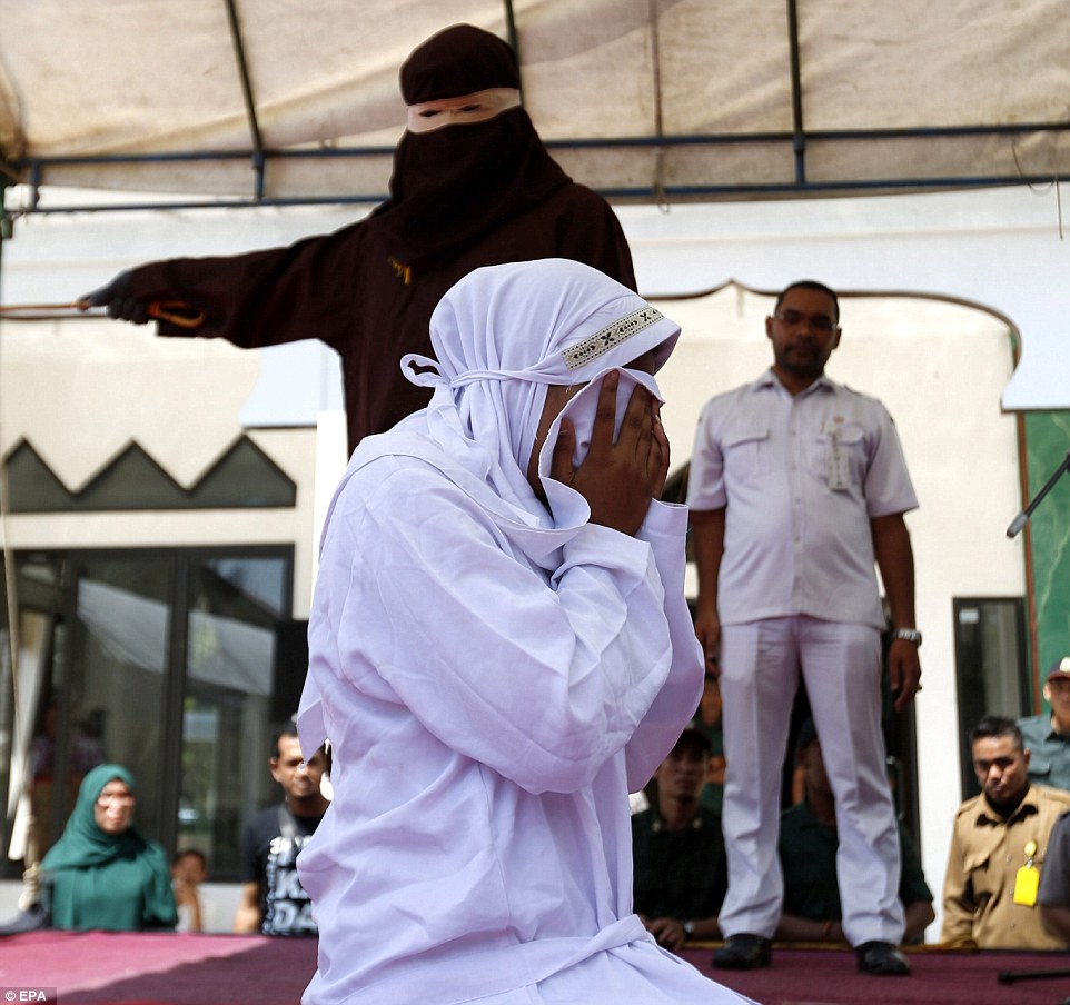 Indonesian woman flogged 100 times for adultery, man gets 15 lashes, Indonesia