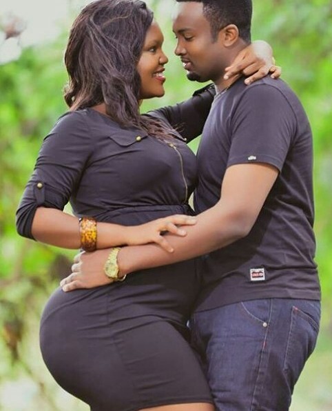 This picture of a Nigerian Man holding on to his wife backside as they rema...