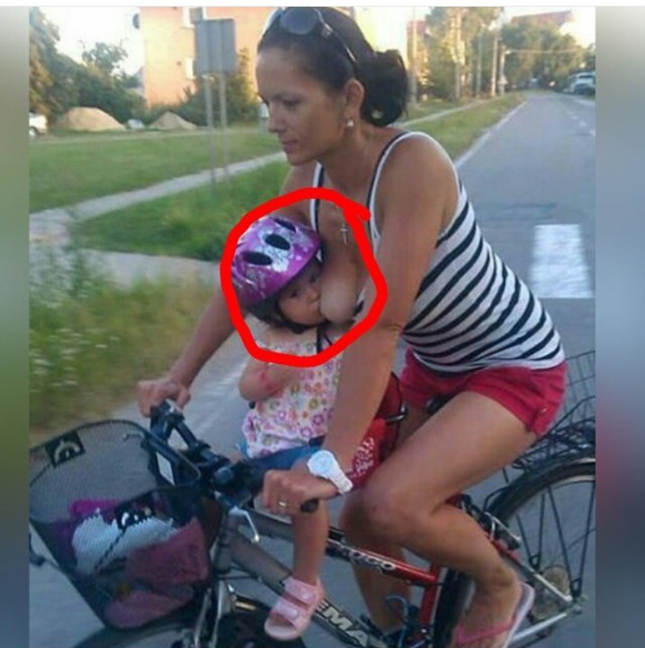 Check Out Woman Riding Bycicle And Same Time Breastfeeding Baby (photo) - F...