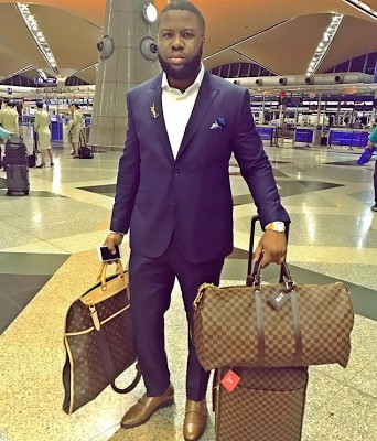 Hushpuppi And His Louis Vuitton Bags Strike A Pose At The Airport