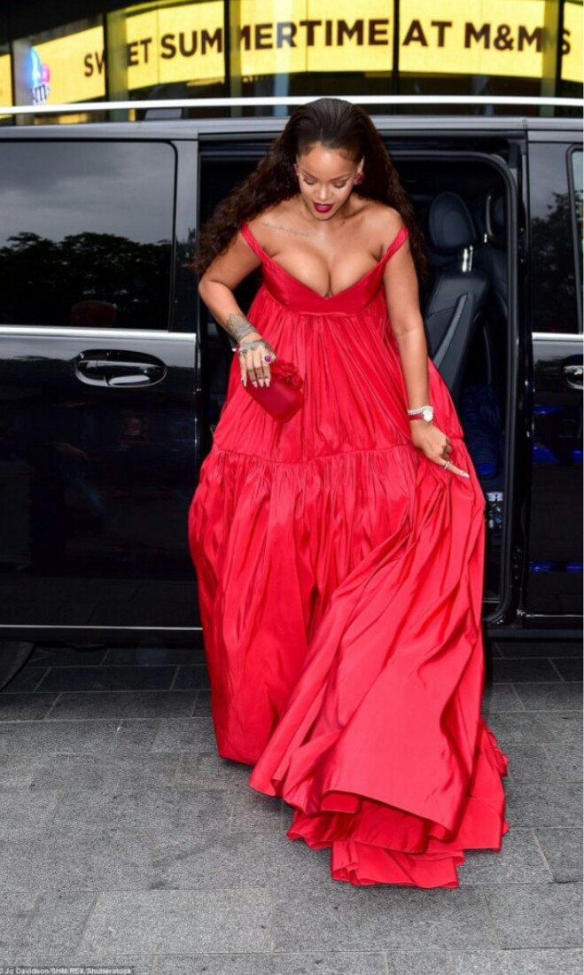Rihanna Struggles With Her Boobs Popped Out In Low-cut Scarlet Gown At  Valerian - Celebrities - Nigeria