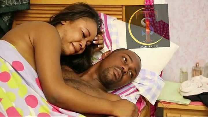 Man And Woman Having Sex In Bed