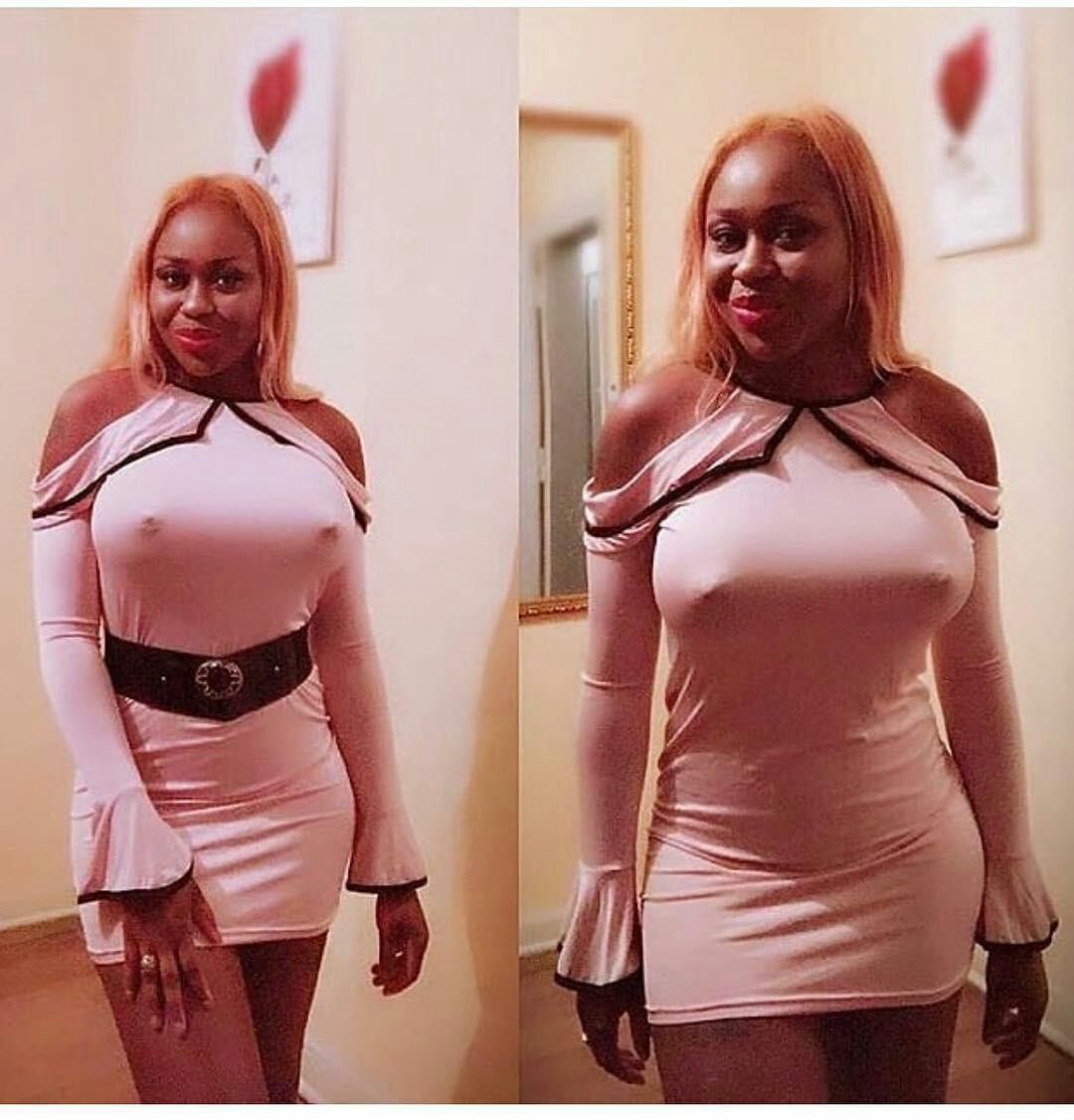 Nigerian lady goes braless to show off her nipple piercings (photos). http