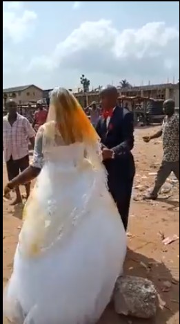 Image result for New Bride got attacked by First wife with palm oil during wedding in Imo state.