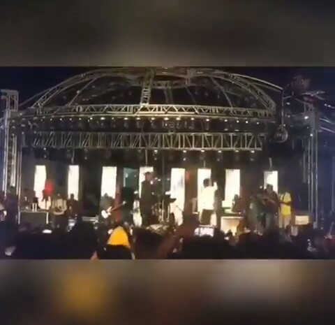 Image result for Wizkid and dammy Krane hug on stage in abuja