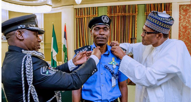 Caption This Photo of New Acting, Adamu and ongoing  IGP of Police, Idris