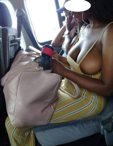 Woman's Breast Spills Out Of Her Dress In A Public Bus In Lagos