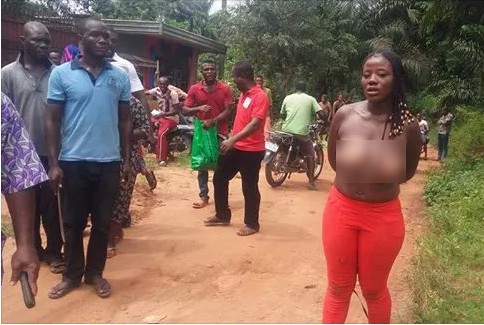 Angry Mob drags woman accused of killing toddler from 