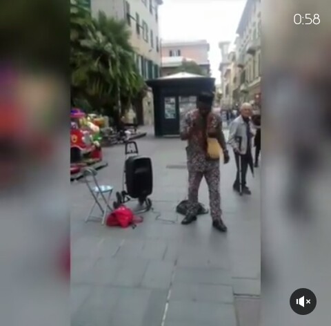 Photos: Meet Nigerian Man Who Sings & Beg On The Streets Of Italy For A Living 1